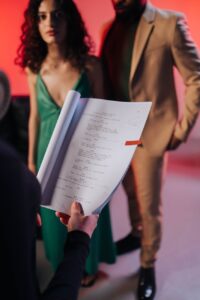 a person holding a script